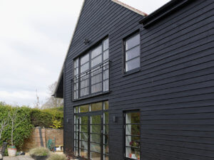 Black Composite Windows and Black timber cladding 