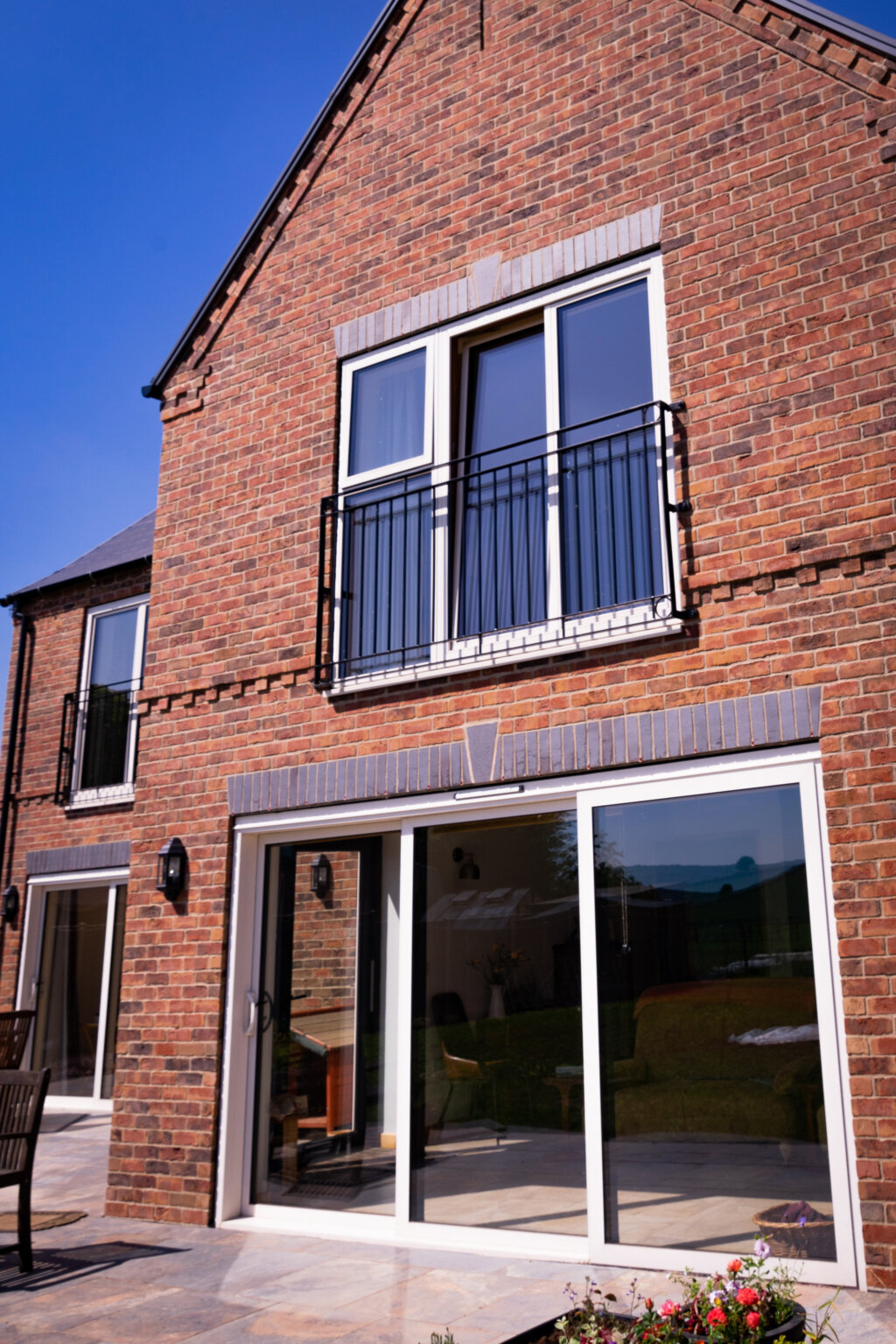 STM Tilt Turn Doors above a 3 peice Sunflex SVG30 sliding door 