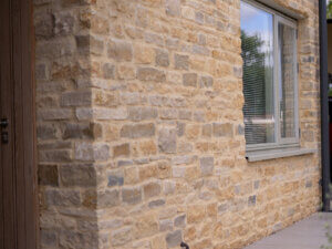 Composite Windows in Stone Building