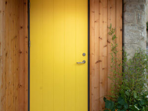 Rationel Flush Zinc Yellow Front Door