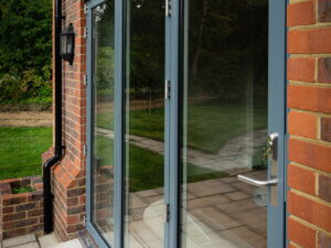 Lacuna bi fold door with a central trickle vent