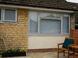 Large 4 pane guided and hung timber window in RAL 7035 Light Grey