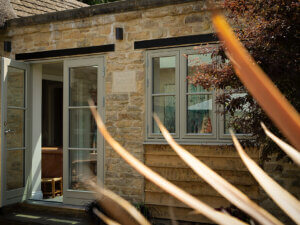RAL 7032 Pebble grey timber doors and windows with glazing bars