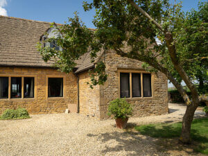 RAL 9005 Jet Black windows with stone mullions surrounds