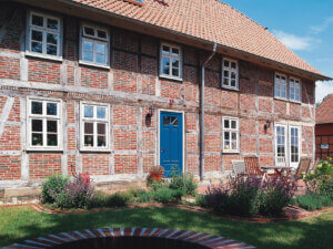 Rosenholm windows in a tudor stone building with glazingbars