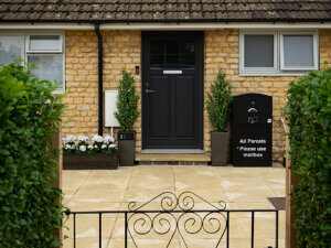 STM Sapino timber door and windows in a cotswold stone home