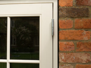STM window installed into a red brick home