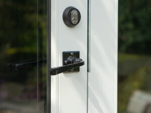 Aftermarket Handle fitted to an aluminium clad timber door