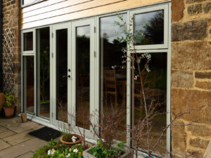 Cotswold Stone house with STM Aluminium clad windows and doors
