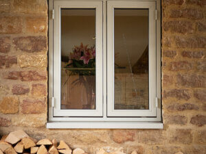 Double side hung Aluminium clad Timber windows with colour matched hinges