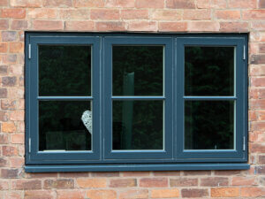 Double side hung window with centre false sash