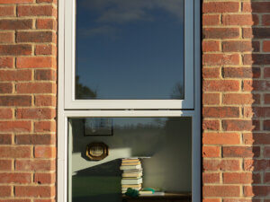 STM Tinium window with Aluminium clad arched head on a short cill