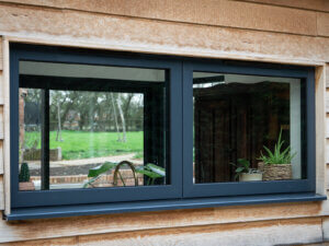 SmartAluminium double Top guided casements with trickle vent in the head