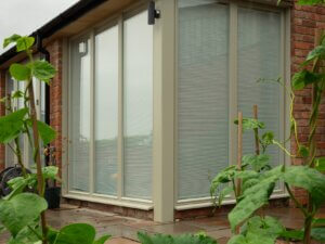 Ral 7032 Pebble Grey Timber corner windows with structural post