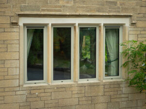 Side guided and Fixed windows with black trickle vents