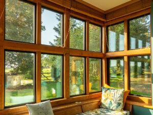 Aluminium triple glazed windows in classic Oak post and beam bay window