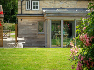 Extension with solar glazing and tilt turn doors
