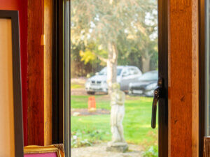 Outward opening Aluitherm heritage window inset into Oak posts