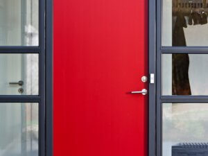 Red panel door leaf with grey frame