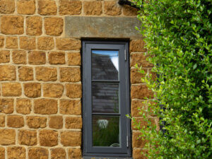 Small sidehung rationel Formaplus window with two horizontal glazing bars