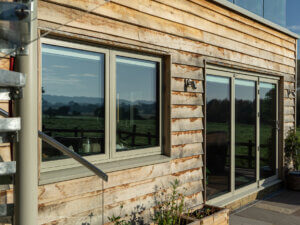Solar Glazed STM Tinium Sidehung window and Lacuna Bifold door