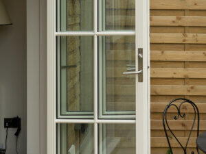 Stacked Lacuna Bifold Door leaves with glazing bars