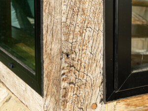 Traditional Oak beam and post bay window with new slim Aluminium windows