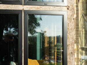 Traditional Oak post bay window with new triple glazed Alitherm Heritage windows