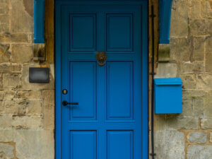 Unik Funkis Aluminium clad Entrance door in RAL 5015 Sky Blue with Black handle and lock