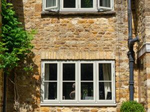 Composite danish windows with a horizontal glazing bar through each sash