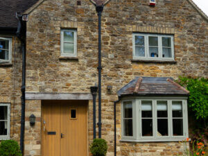 RAL 7032 Aluminium clad timber windows in a cotswold home 01