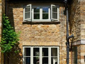 Sidehung and False Sash STM Tinium windows with glazing bars in a cotswold home