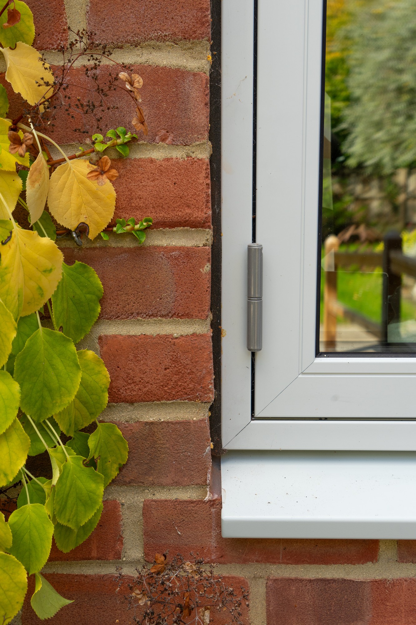 STM Tinium aluminium clad windows installed with compriband tape weather seal STM Tinium aluminium clad windows installed with compriband tape weather seal