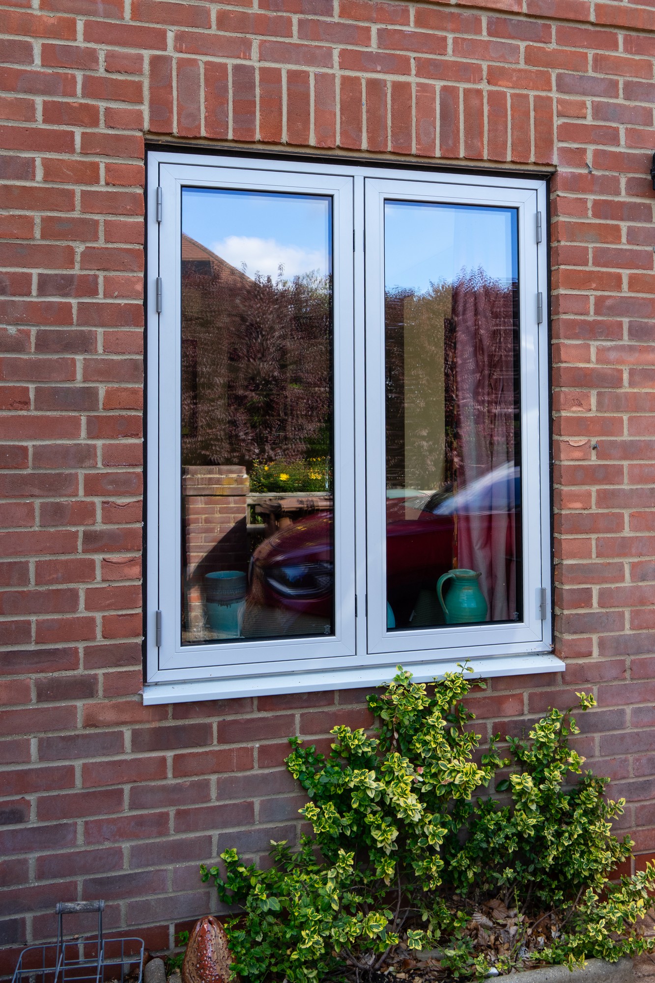 STM Tinium double sidehung windows on an aluminium cill STM Tinium double sidehung windows on an aluminium cill
